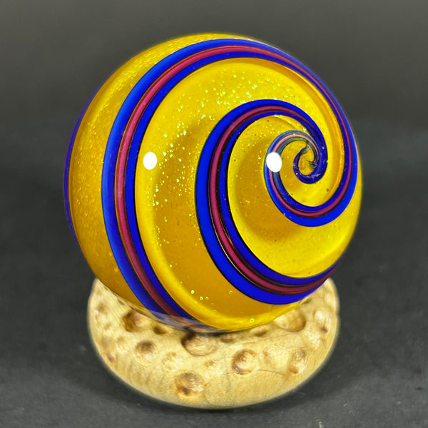 Geoffrey Beetem Art Glass Marble, Yellow dichroic core with spiral’s 1.39”