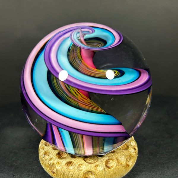 Geoffrey Beetem Art Glass Marble, pink core, wide double band in blue, pink and yellow  1.57”