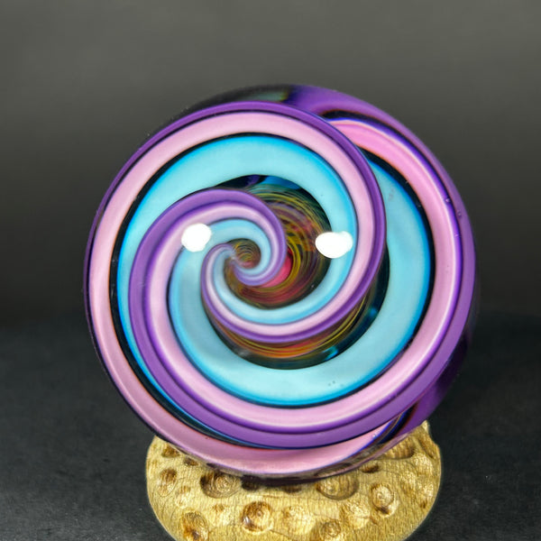 Geoffrey Beetem Art Glass Marble, pink core, wide double band in blue, pink and yellow  1.57”
