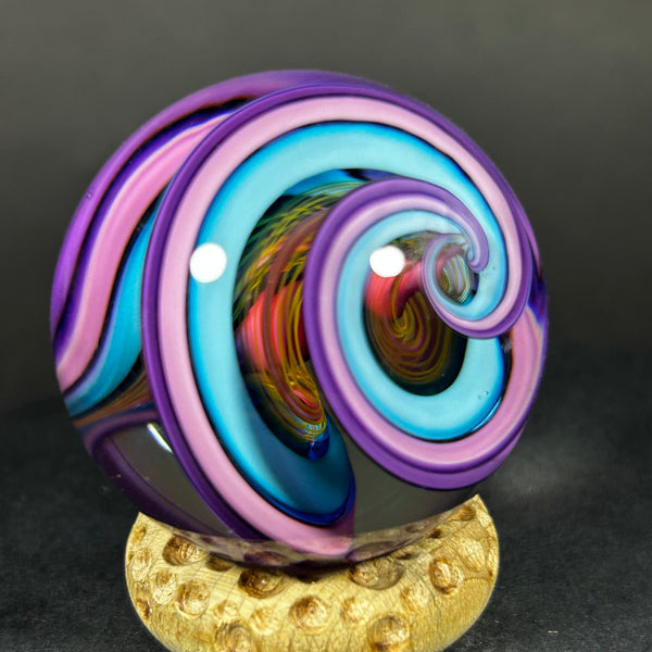 Geoffrey Beetem Art Glass Marble, pink core, wide double band in blue, pink and yellow  1.57”