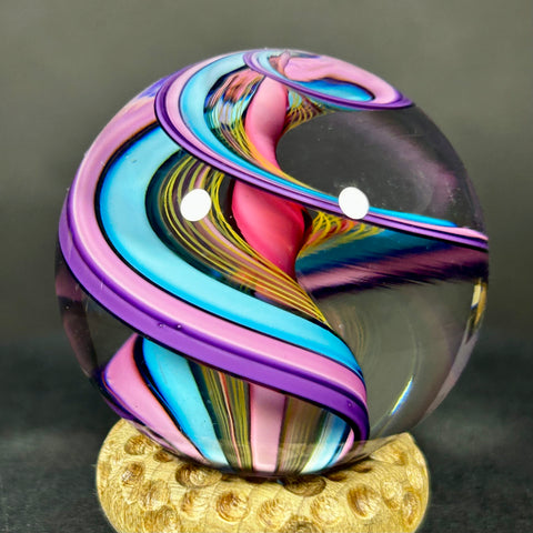 Geoffrey Beetem Art Glass Marble, pink core, wide double band in blue, pink and yellow  1.57”