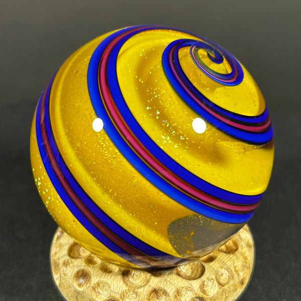 Geoffrey Beetem Art Glass Marble, Yellow dichroic core with spiral’s 1.39”