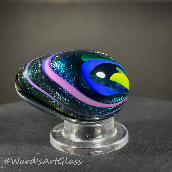 Rolf Wald Art Glass Egg, Solid Lutz Core with Bent Fine Line Rainbow 1.50"