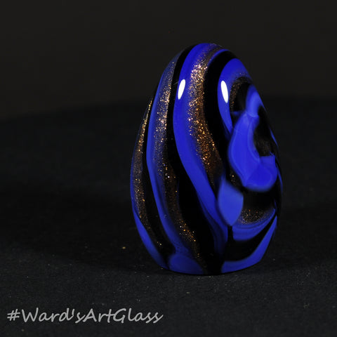 Rolf Wald Art Glass Egg, Black and blue Chaos over Gold Lutz, Flat Bottom, 1.18"