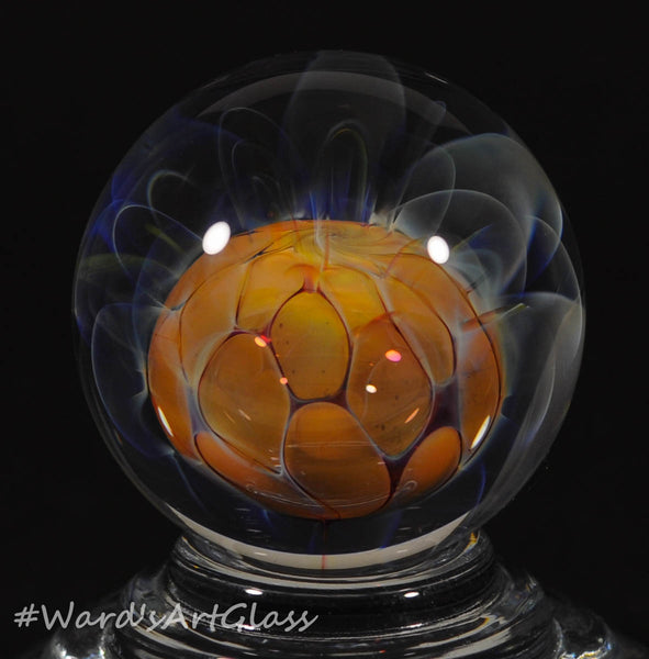 Andrew Groner Carmel bead floating in a fumed webbing, with ghost plumes. 1 1/8” - Ward's Art Glass, [product type] - Art Glass, Marble