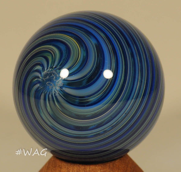 Fritz Lauenstein Furnace Soft glass Marble, Blue band waves over clear core - floating, 1.58" - Ward's Art Glass, [product type] - Art Glass, Marble