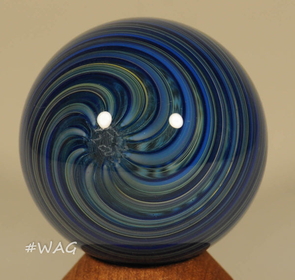 Fritz Lauenstein Furnace Soft glass Marble, Blue band waves over clear core - floating, 1.58" - Ward's Art Glass, [product type] - Art Glass, Marble